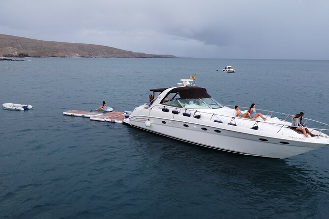 4 Hour Boat Tour with Snorkeling from Puerto Rico and Mogan - Playa Taurito: a short coastal stop