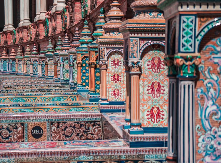 Algarve: Seville Full-Day Shopping and Sightseeing Tour - Crossing Triana Bridge into Seville