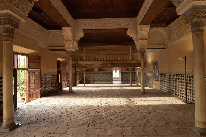 Alhambra and Nasrid Palaces Ticket with Audioguide - Collecting tickets near the Alhambra