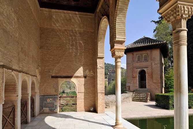 Alhambra Guided Tour & Albaicin Tour from Seville - Charles V’s Palace and the layered story of Granada