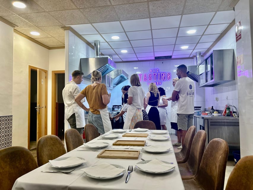 Alicante Paella Cooking Class, Tapas, Drinks and Market - The five-minute walk into the kitchen