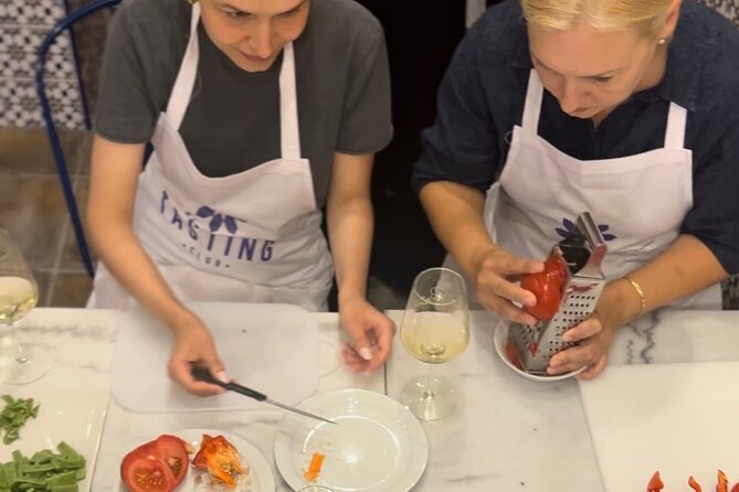 Alicante Paella Cooking Class, Tapas, Drinks and Marketplace - Sitting down to eat the paella you helped make