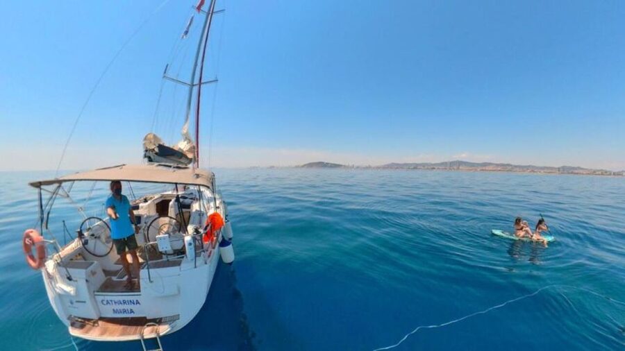 Barcelona: 2-Hour Sunset Sailboat Trip - Swimming, paddleboarding, and floating in Barcelona