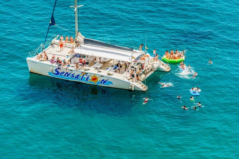 Barcelona: Catamaran Party Cruise with BBQ Meal - Cruising from Port Olímpic toward Badalona