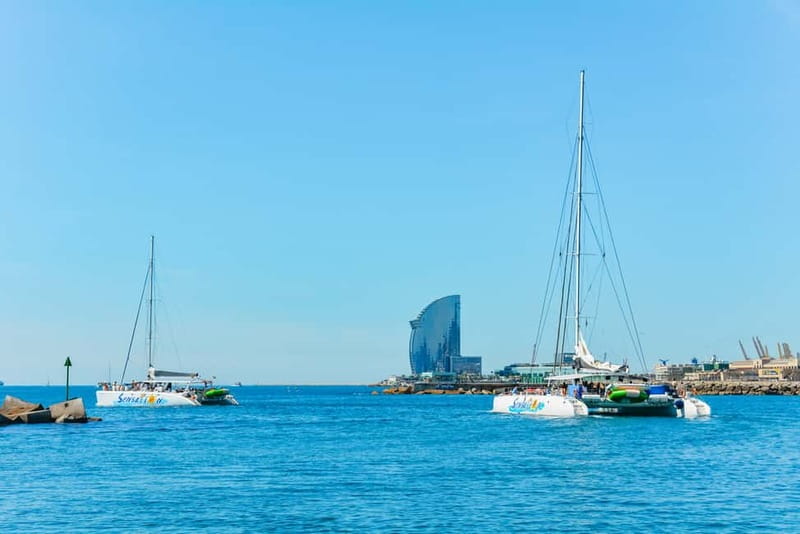 Barcelona: Catamaran Party Cruise with BBQ Meal - Evening sailing, snacks, cava, and the TARDEO