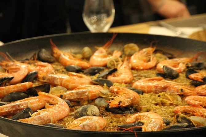 Barcelona Culinary Experience: Paella & Tapas Cooking Class - Cooking rather than watching at Cook&Taste