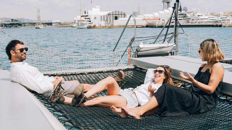 Barcelona: Daytime or Sunset Catamaran Cruise with Music - Music, drinks, and the onboard mood