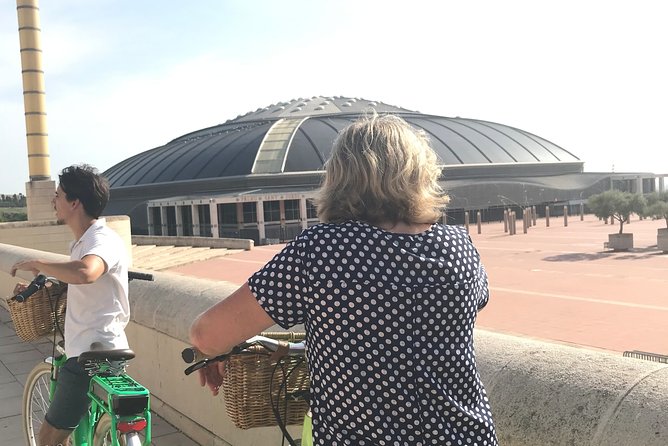 Barcelona E-Bike Guided Tour with Montjuic Hill - Climbing Toward Montjuïc Park