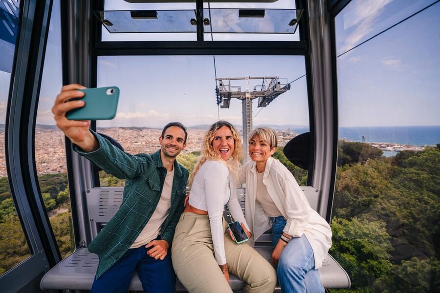 Barcelona: E-Bike Tour with Montjuic Cable Car & Boat Ride - Reaching Montjuïc by funicular and cable car