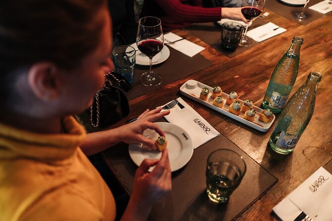 Barcelona: Guided Food Walking Tour with Tapas and Wine - First plates on Carrer Ample