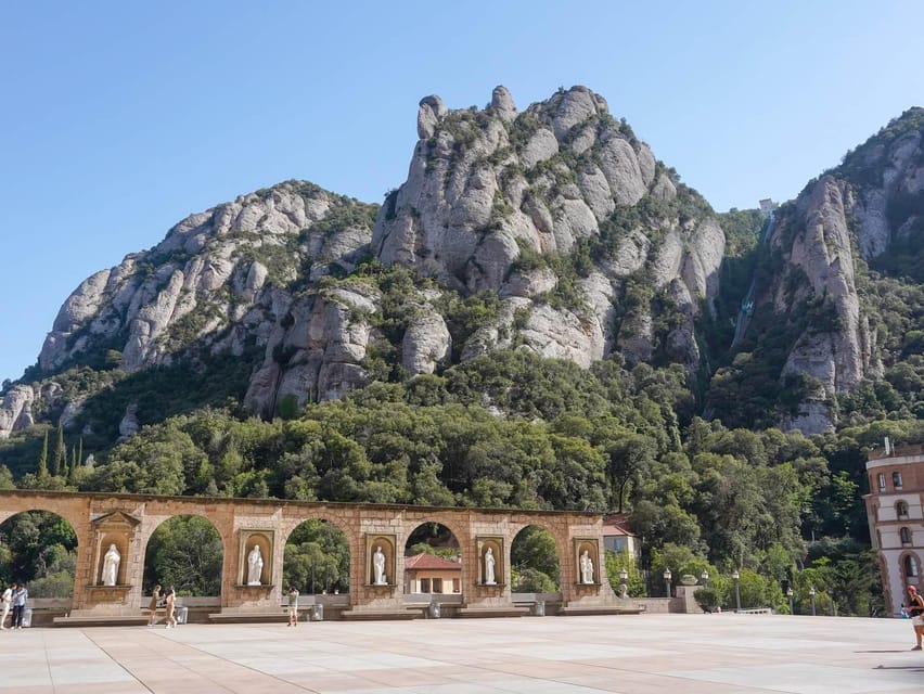 Barcelona: Montserrat Tour with Cog-Wheel & Black Madonna - Leaving Barcelona and changing from coach to train