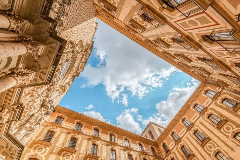 Barcelona: Montserrat Tour with Transport & Basilica Option - Food, museum time, and the Basilica choice