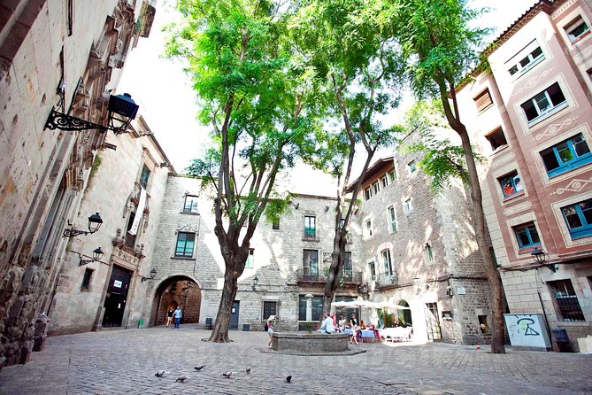 Barcelona Old Town & Gothic Quarter Small Group Tour - Plaça Reial and the first public work linked to Gaudí