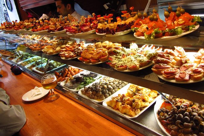 Barcelona Old Town Night Small Group Tour with Tapas & Flamenco - Las Ramblas and the first taste of tapas
