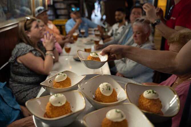 Barcelona Old Town Tapas Tour: Vermouth, Bites & Hidden Gems - City Hall, a local sweet, and the final food note