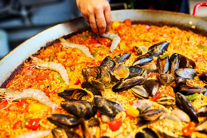Barcelona Paella Cooking Class with Market Visit, Tapas & Sangria - Tapas first, then a hands-on sangria workshop