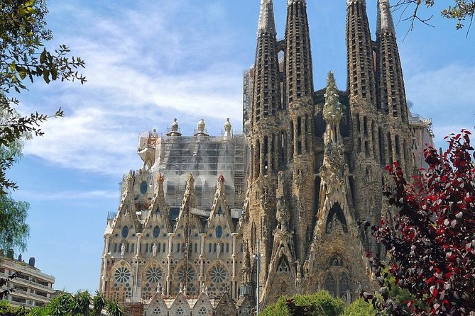 Barcelona: Sagrada Familia Fast Track Tour with Tower Option - Inside the basilica: columns, light, and symbols