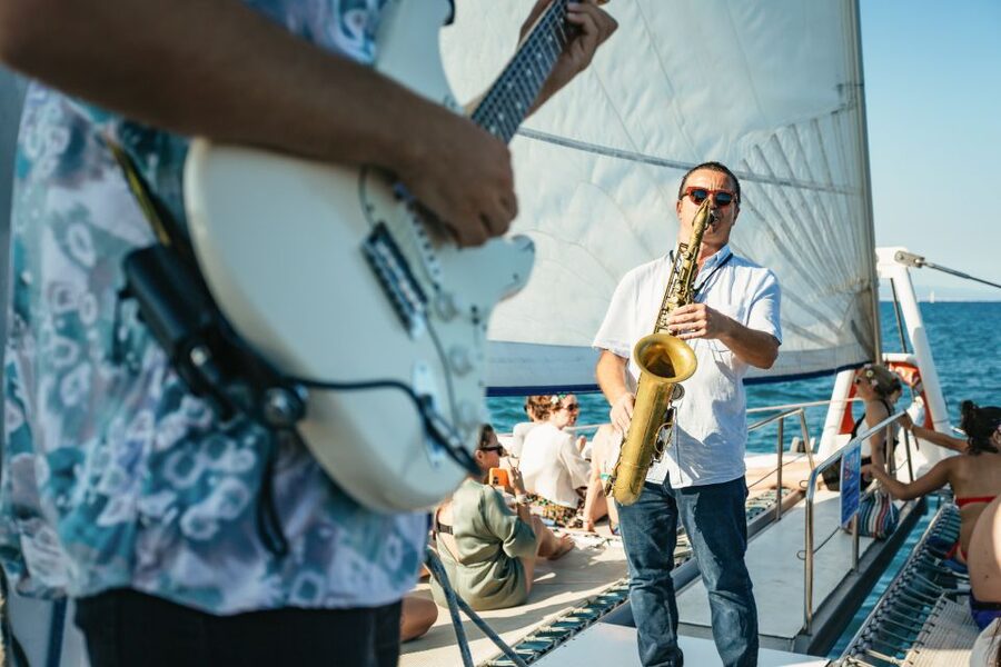 Barcelona: Sunset Catamaran Cruise with Live Music - Sailing out from Barcelona’s coast