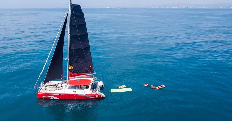 Barcelona: Sunset or Day Catamaran Cruise with Tapa & Drink - Key points at a glance