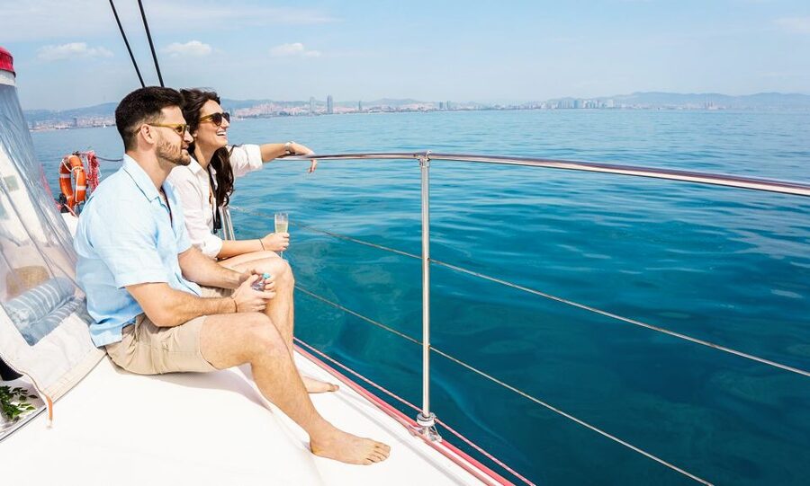 Barcelona: Sunset or Day Catamaran Cruise with Tapa & Drink - The catamaran, seating, and group size