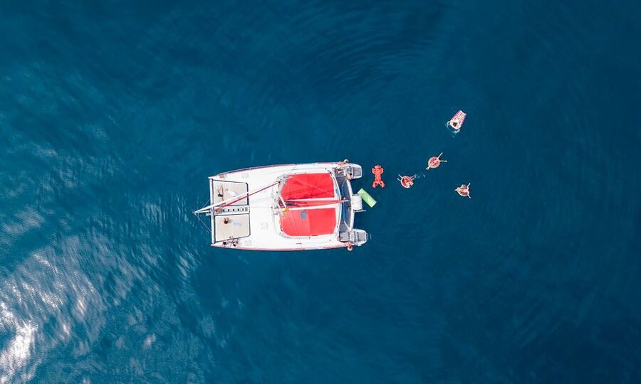 Barcelona: Sunset or Day Catamaran Cruise with Tapa & Drink - Crew service and the atmosphere on board