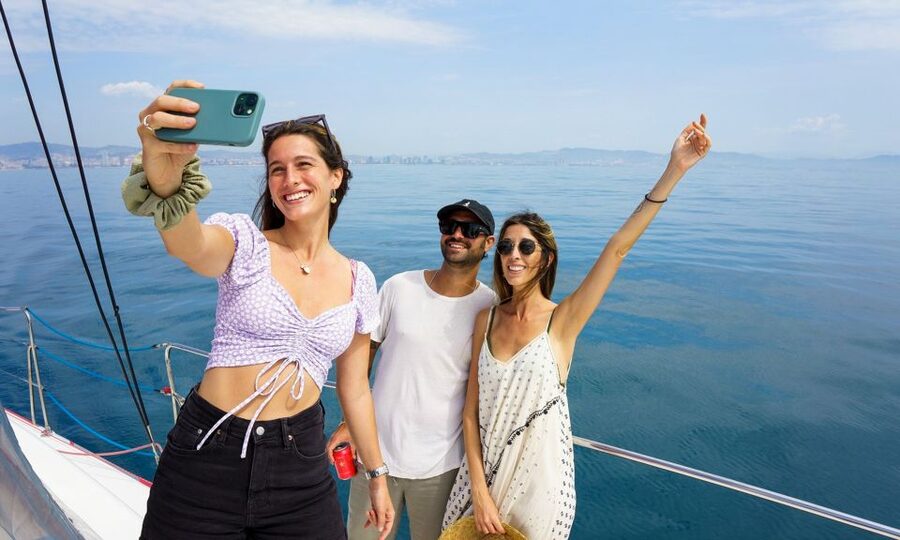 Barcelona: Sunset or Day Catamaran Cruise with Tapa & Drink - Starting at Marina Vela near Barceloneta