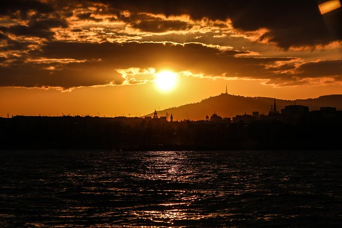 Barcelona Unique Sunset Sailing Experience with Tapas & Open Bar - Live guitar or saxophone for the sunset