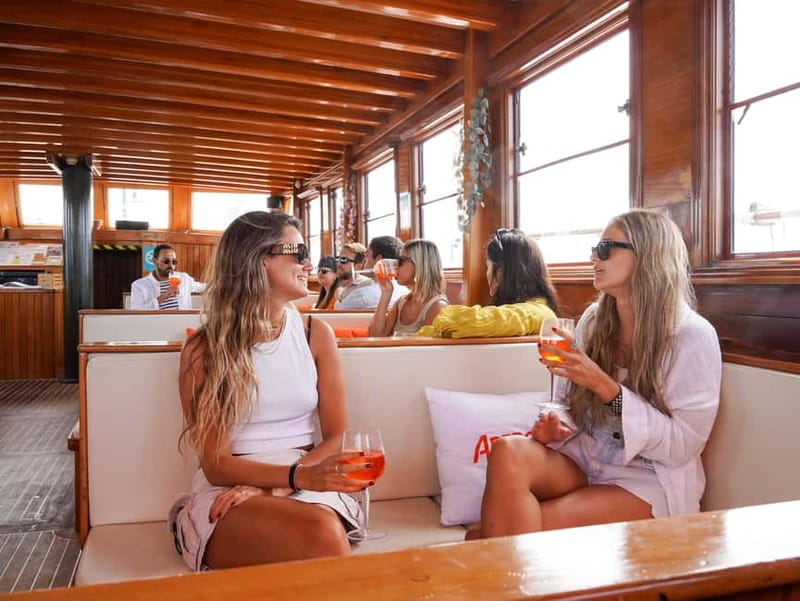 Barcelona: Wooden Boat Sailing with Tapa and Welcome Drink - A tapa, welcome drink, and the onboard bar