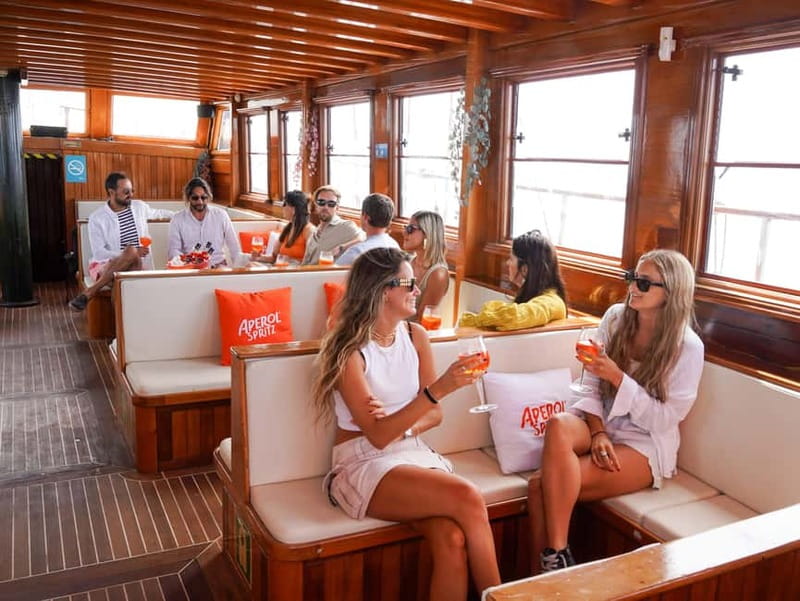 Barcelona: Wooden Boat Sailing with Tapa and Welcome Drink - Weather, comfort, and practical preparation