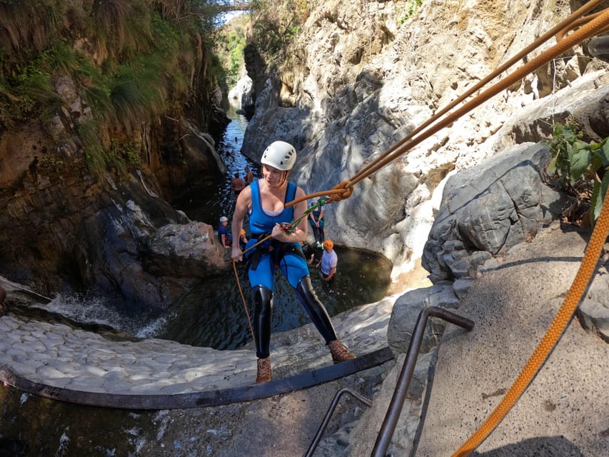 Benahavís: Canyoning Guided Tour at Guadalmina River - Swimming through the narrow canyon