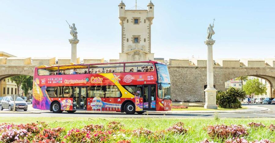 Cadiz: City Sightseeing Hop-On Hop-Off Bus Tour - Avenida del Puerto to the old city gates