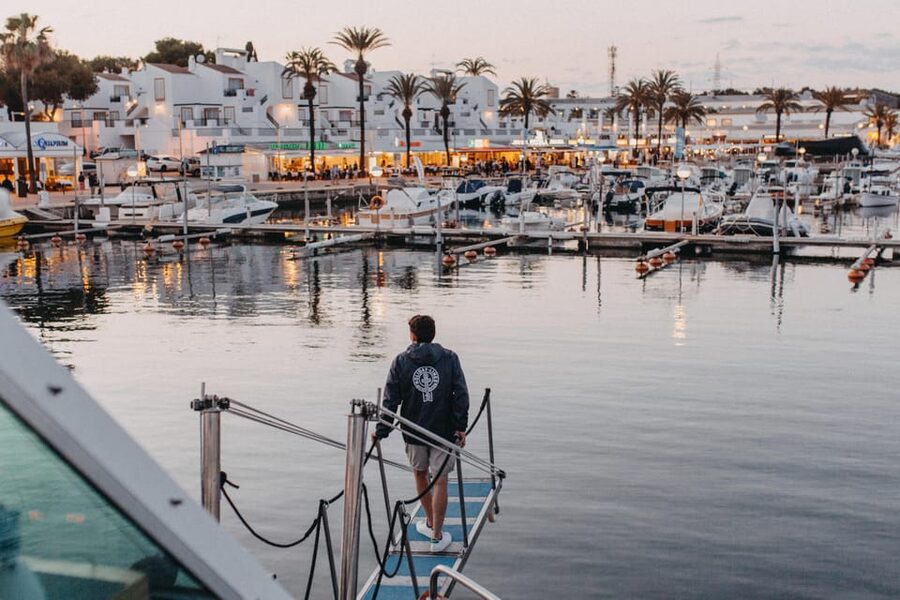 Cala'n Bosch: 2-Hour Sunset Sightseeing Tour - Commentary, music, and the onboard mood