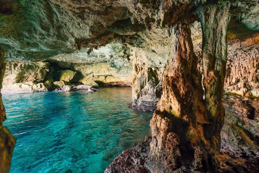 Cala Varques: Guided Sea Caves Kayak & Snorkeling Expedition - Sea caves, pirate stories, and rock arches