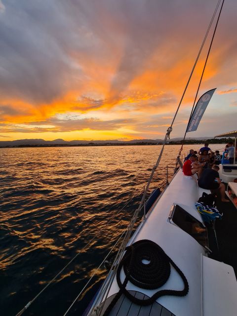 Cambrils: Costa Dorada Sunset Catamaran Cruise with Drinks - The first hour follows beaches and fishing villages