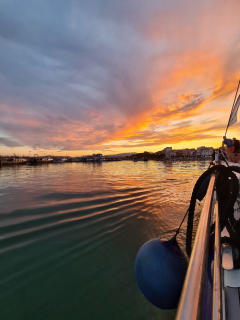 Cambrils: Costa Dorada Sunset Catamaran Cruise with Drinks - The anchor stop brings a short swim in the sea