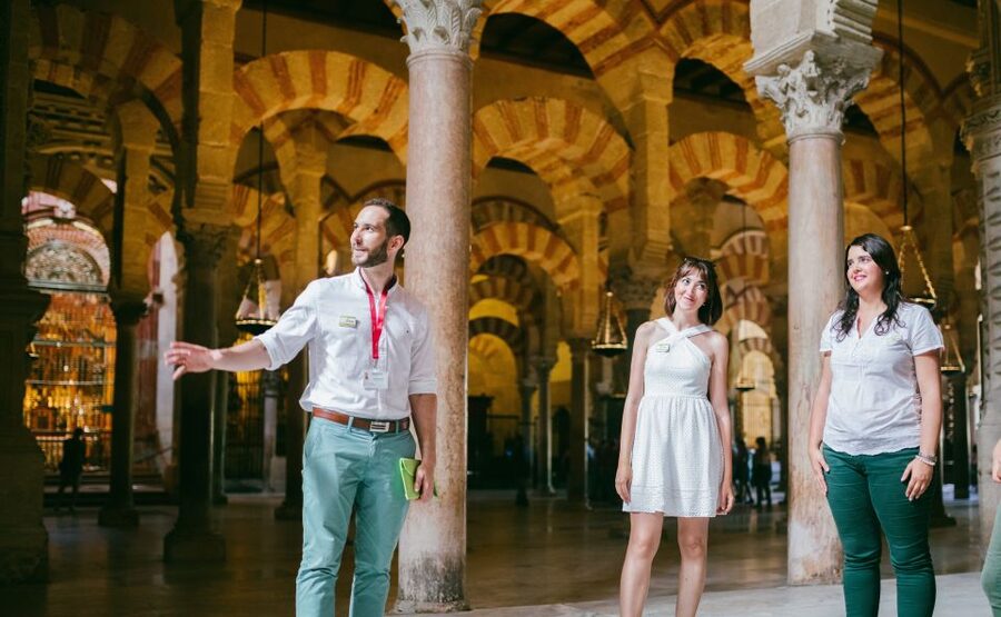 Córdoba: Mosque-Cathedral & Alcazar Guided Tour - Walking into the Alcázar as a royal seat