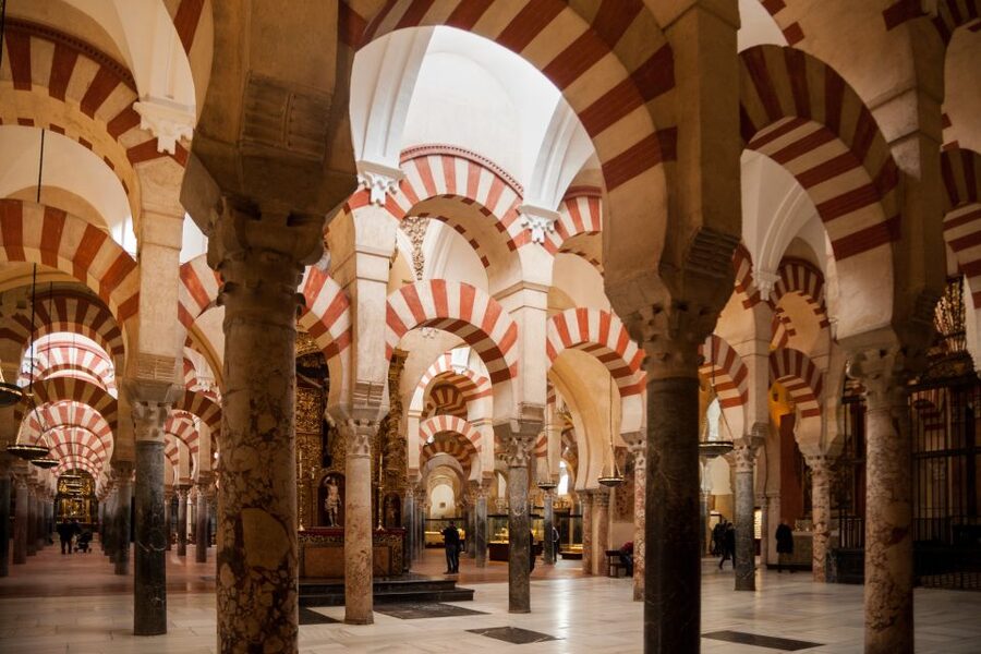 Córdoba: Skip-the-Line Great Mosque-Cathedral History Tour - Seeing a cathedral built inside a former mosque