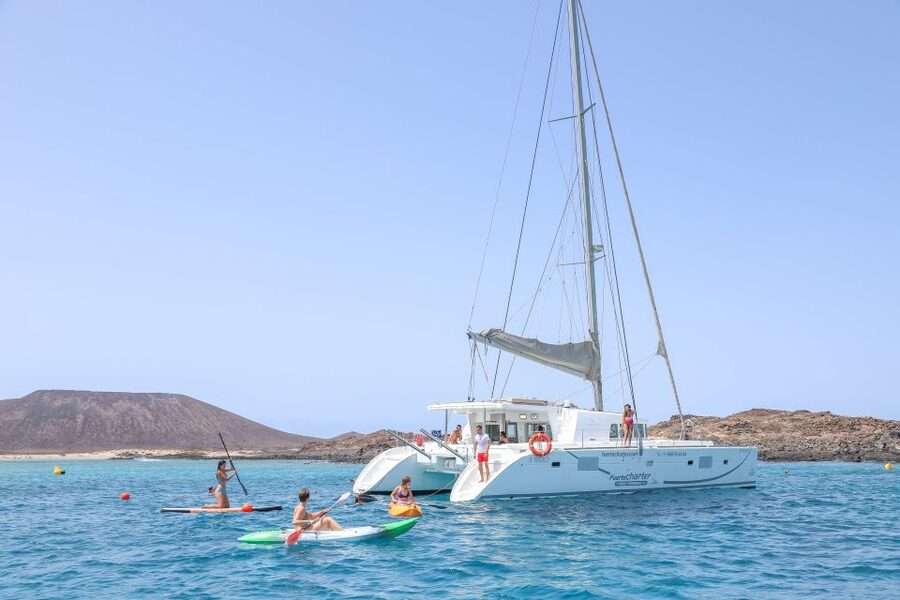 Corralejo: Adults-Only Catamaran Day Trip to Lobos Island - Sailing across El Río from Corralejo