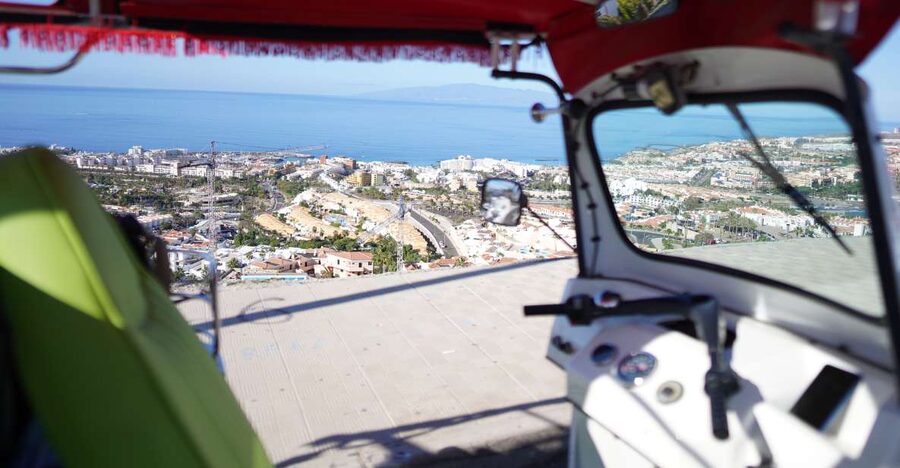 Costa Adeje: Secret Volcano Tuk Tuk Tour - Riding uphill through Costa Adeje