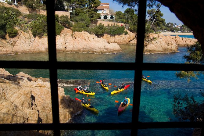 Costa Brava - Kayaking and Snorkeling "Sea Caves" Tour - Entering the sea caves near Sant Feliu de Guíxols