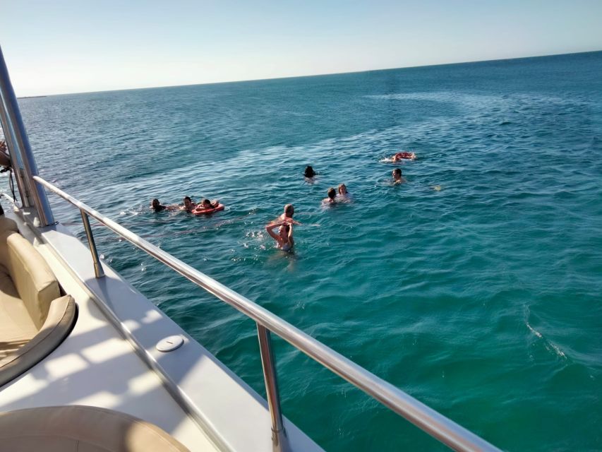 Denia: Cova Tallada Catamaran Tour and Swimming Stop - Music, a drink, and two hours at sea