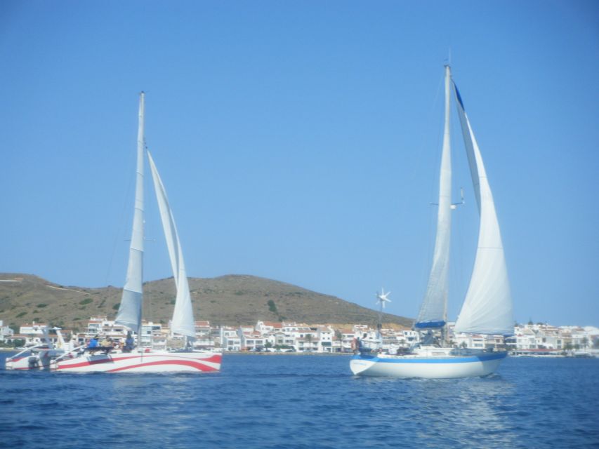From Fornells: Half-Day Menorca Catamaran Trip w/ Snorkeling - Snacks, drinks, and the value of the $88 price