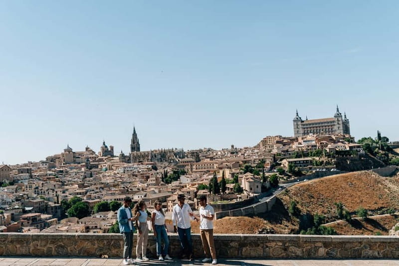From Madrid: Toledo City Tour and Wine Tasting Experience - Guides, buses, and group size