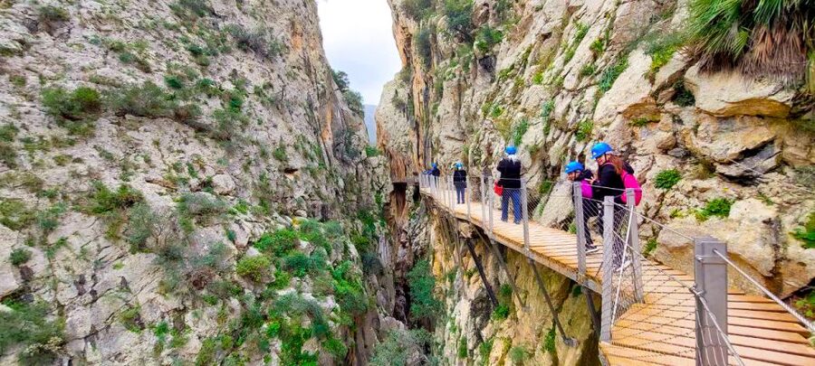 From Málaga: Caminito del Rey Guided Day Trip - Entering the gorge with a helmet and safety briefing