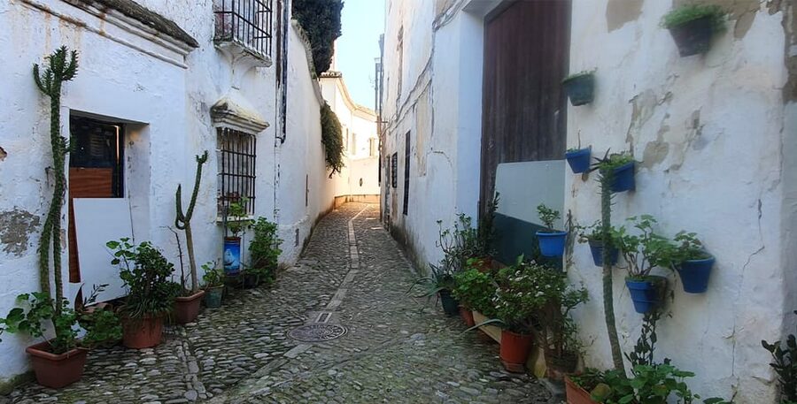 From Malaga: Ronda and Setenil Tour with Scenic Train - Walking beneath the rock roofs