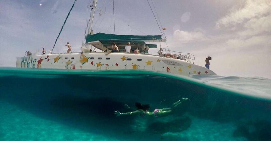 From Palma de Mallorca: Boat Cruise to Illetes - Arriving at Illetes by catamaran