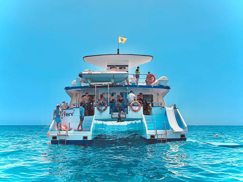 From Puerto Rico: Boat trip along the coast w/ Food & Drinks - Coast views, cliffs, and the chance of dolphins