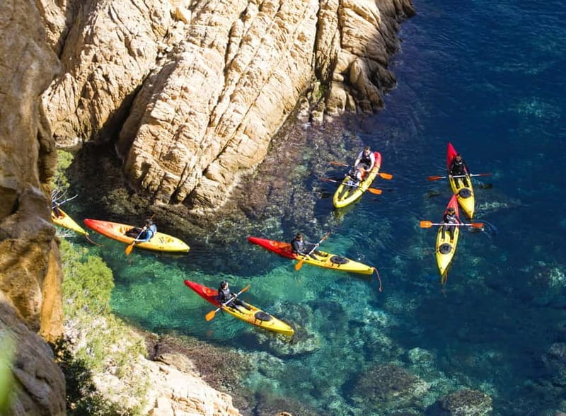 From Sant Feliu de Guíxols: Kayak and Snorkel in Costa Brava - Starting beside the boats on Sant Feliu beach