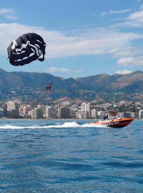 Fuengirola: Deluxe Parasailing Flight from Fuengirola Port - Taking off from the specialized winch boat