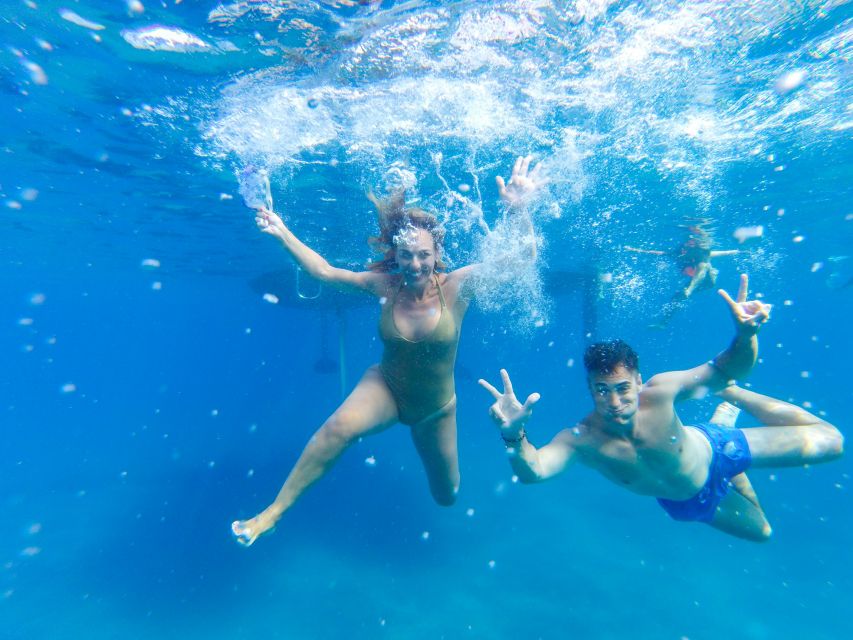Fuerteventura: Sailing with Snorkeling and Dolphin Watching - Tapas, wine, and local food on deck